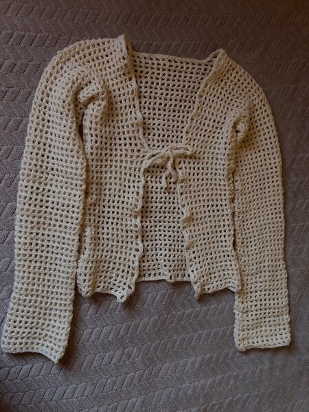 Cream white crochet cardigan.