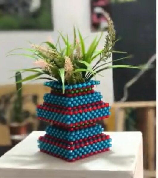 Handcrafted beaded flower vase