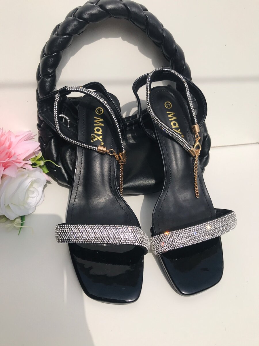 Luxury silver and black heel