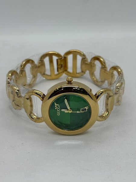 Montre femme élégante dorée