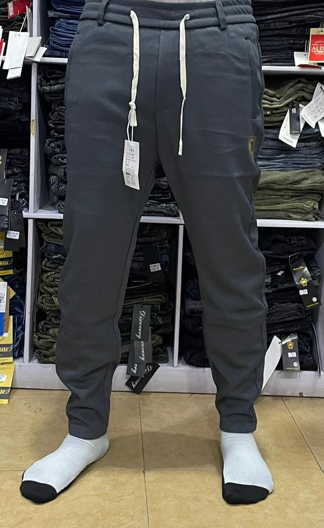 gray baggy pants with white drawstring