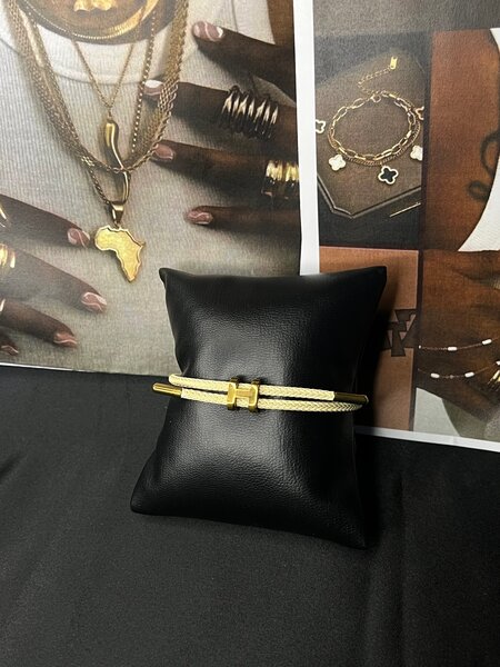 Bracelet hermès doré élégant