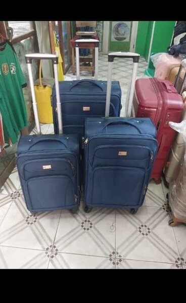Valises à roulettes en tissu