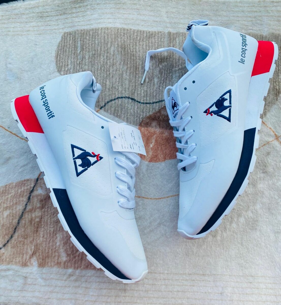 Ie coq sportif
