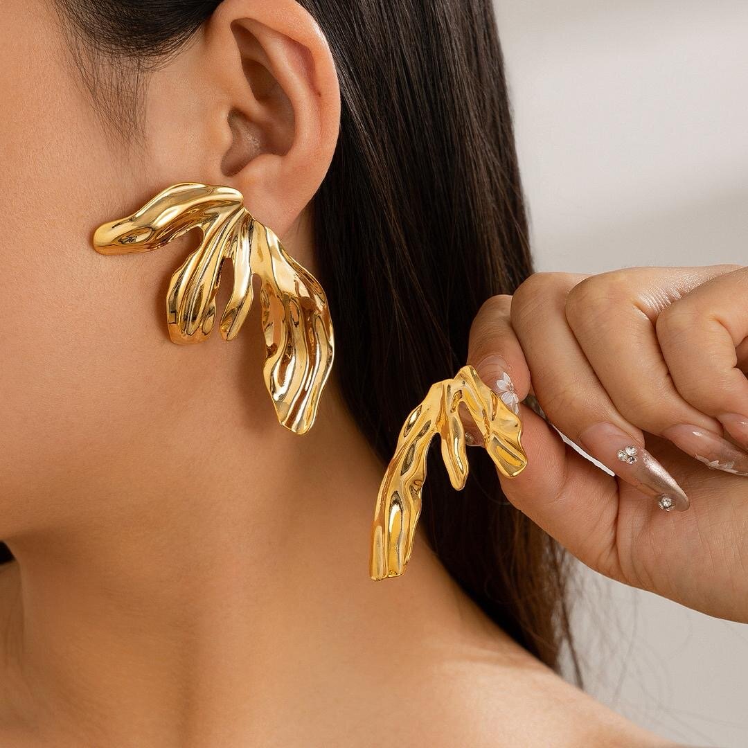 Boucles d'oreilles dorées tendance