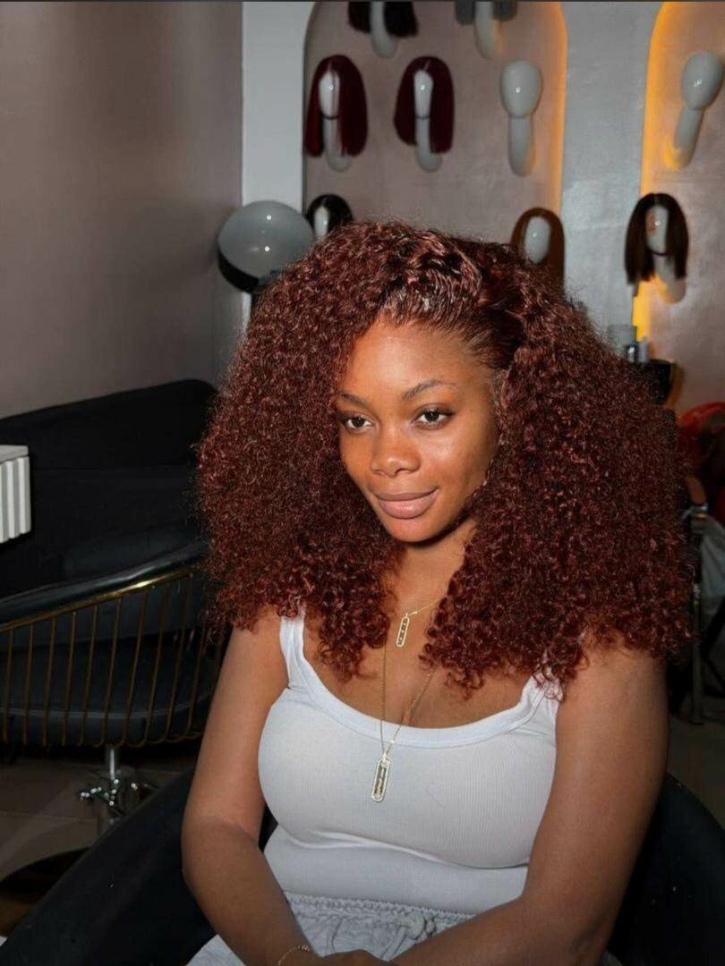 Perruque bouclée marron volumineuse
