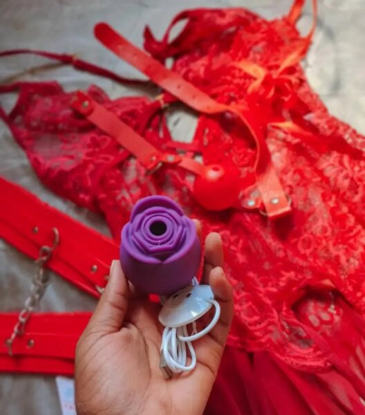 Vibromasseur rose suceur