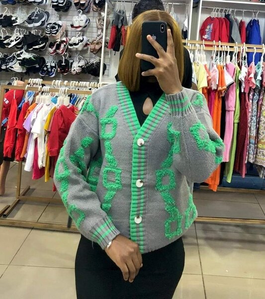 Grey cardigan with green decorations