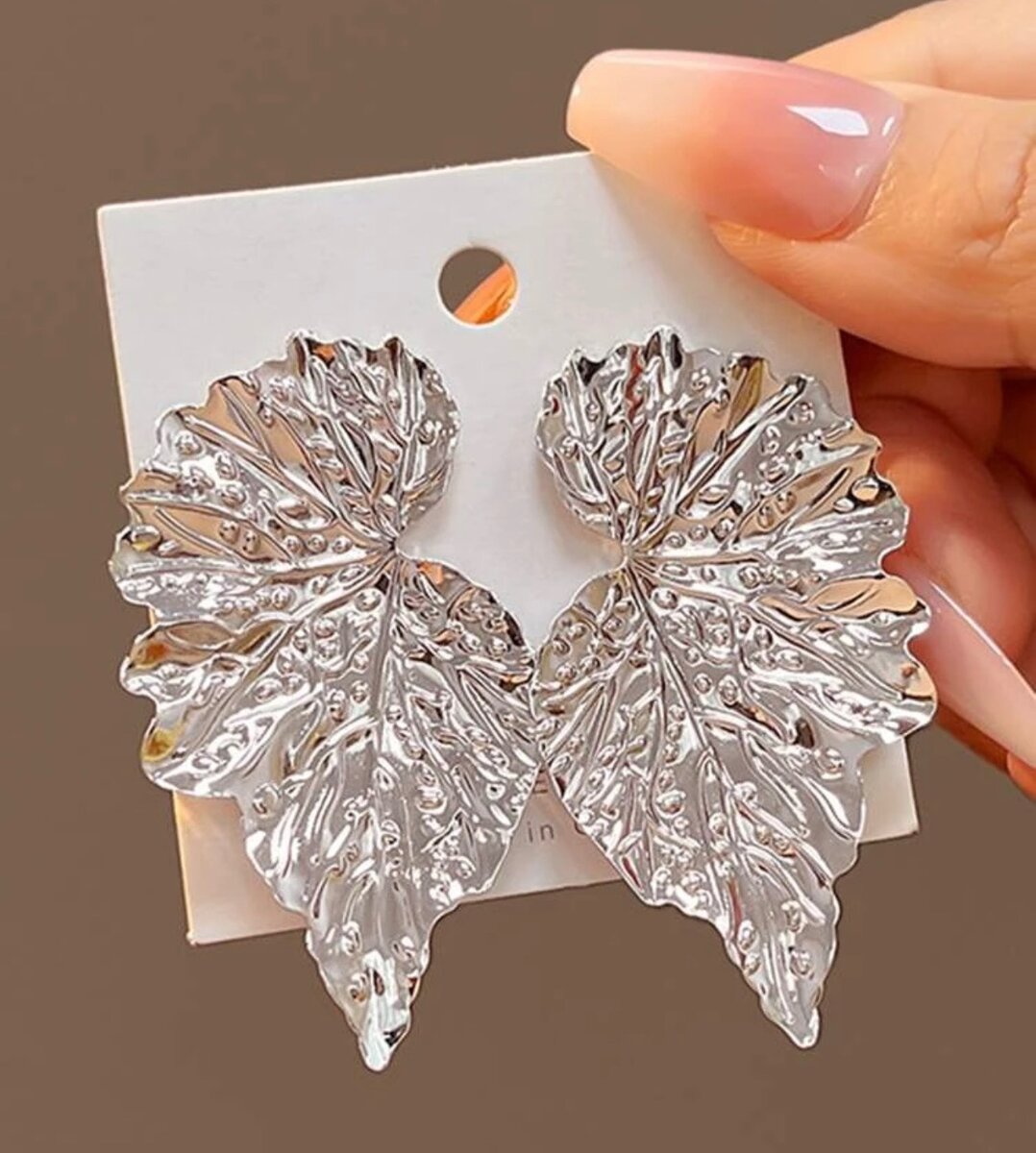 Atomizer phone grip ear ring