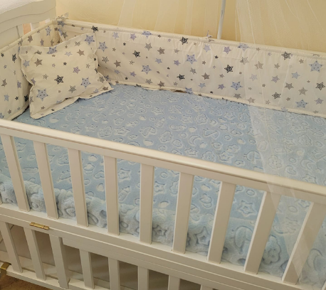 white sideboard for a bed with stars