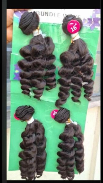 Extensions de Cheveux Bouclés