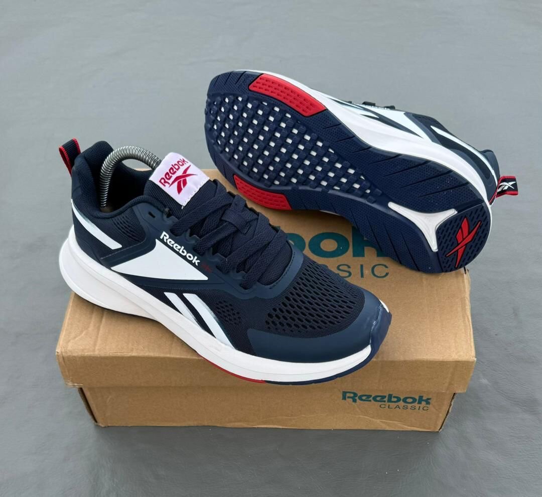 Reebok Baskets de Course Homme