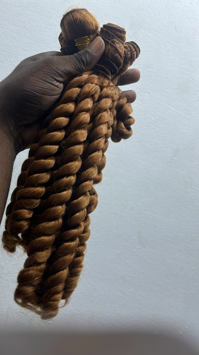 Extensions capillaires bouclés