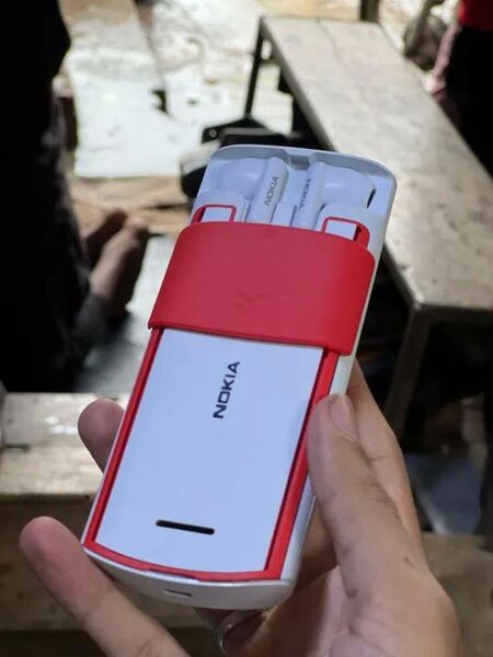 Nokia 5710 XA - 4G mobile phone, built-in wireless headphone