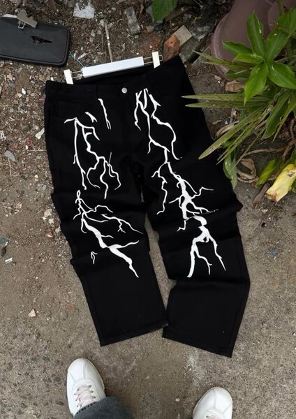 Pantalon noir motif éclair