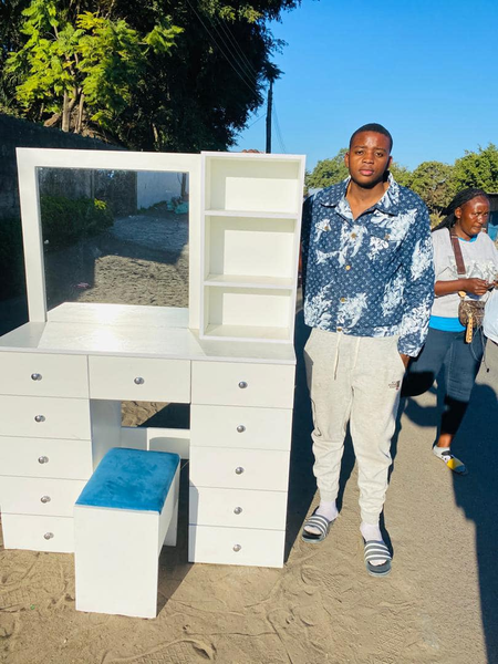 white makeup table with mirror