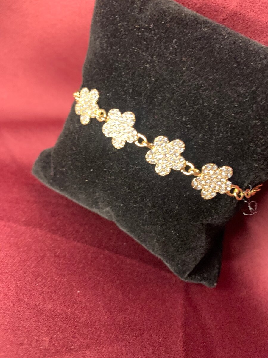 Bracelet doré trèfle étincelant