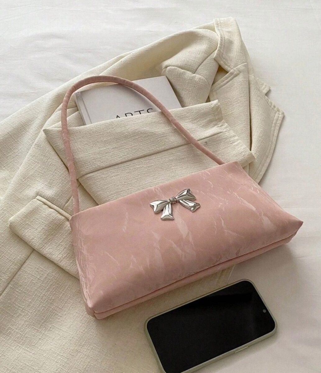 Sac à main rose avec nœud