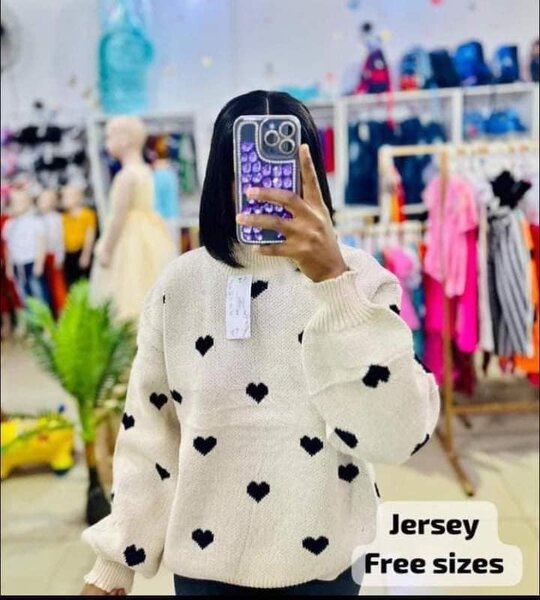 White sweater with black heart print