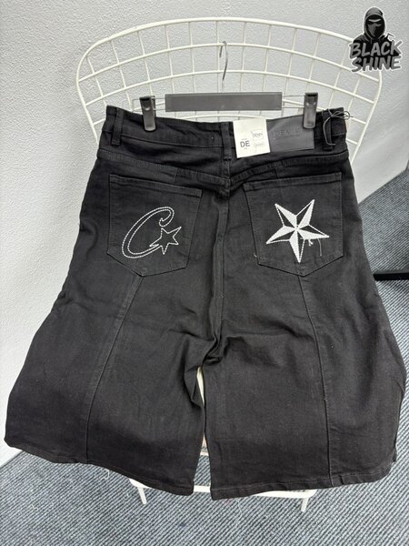 Shorts noirs avec motif étoile