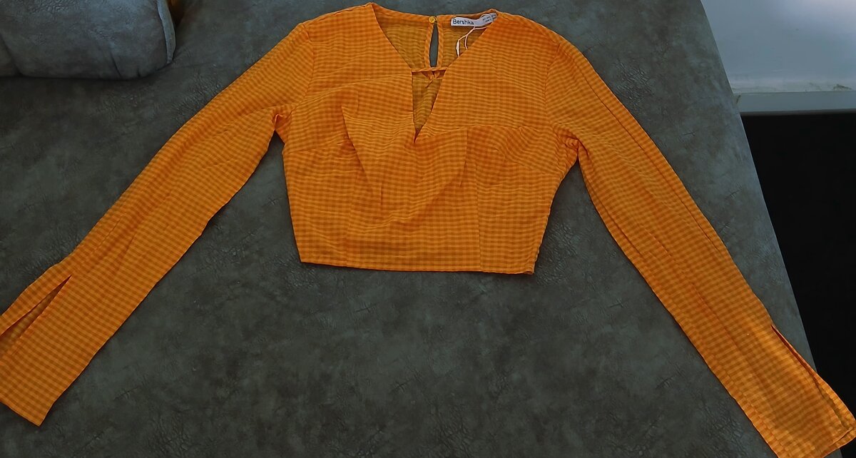 Blouse orange à carreaux