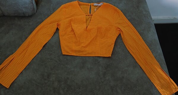 Blouse orange à carreaux