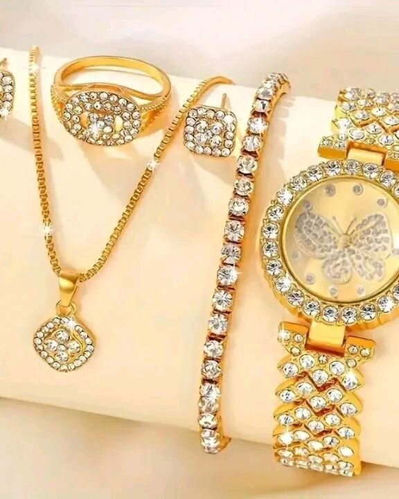 Parure bijoux dorée strass