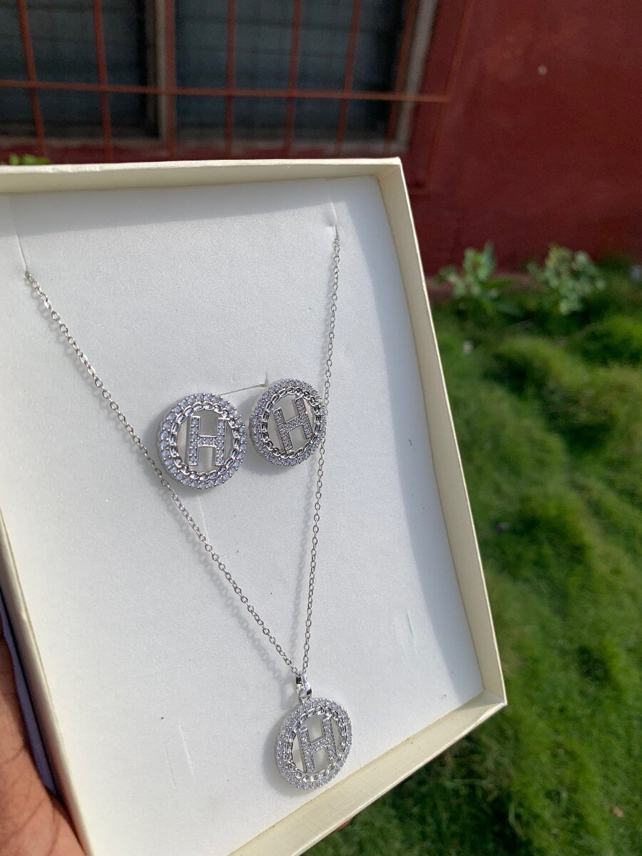 Silver necklace with matching earrings