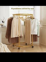 Portant à vêtements rotatif élégant