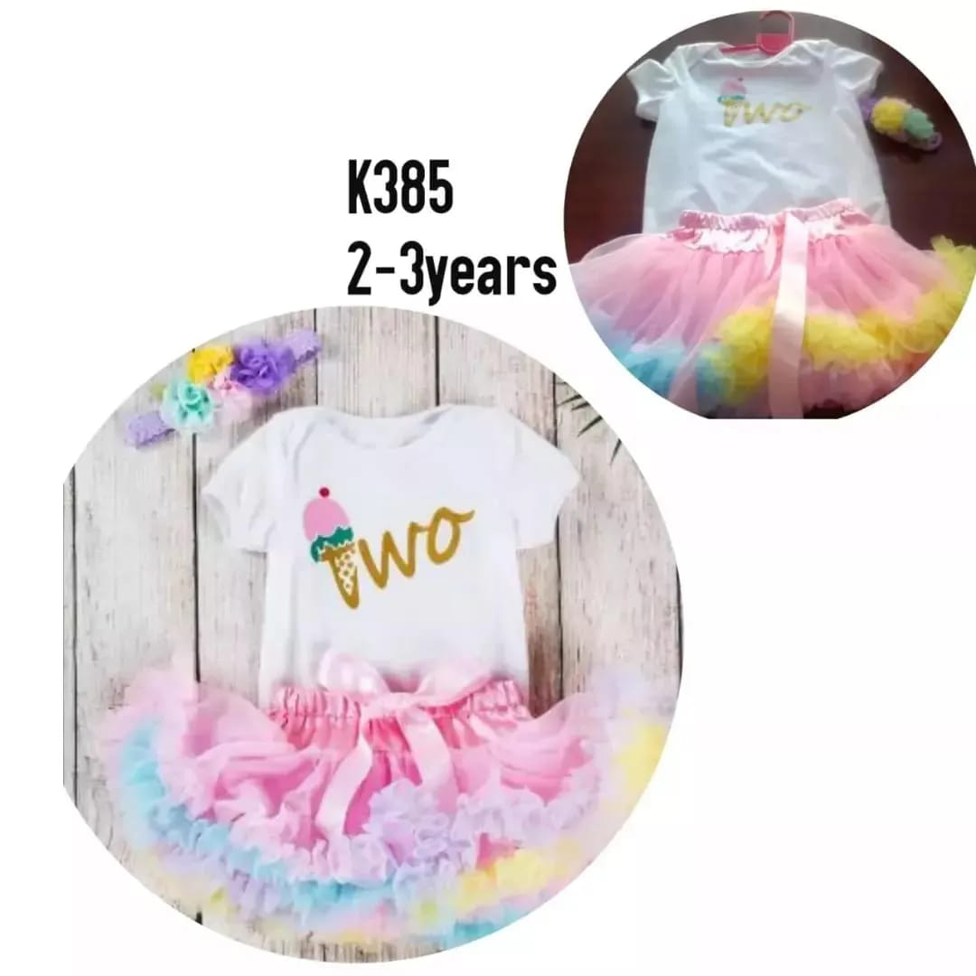 white printed T-shirt and pink lace skirt