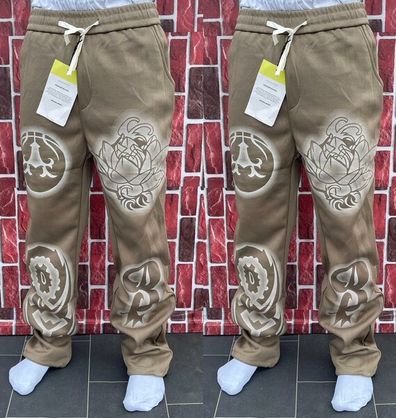 Pantalon de jogging beige motif floral