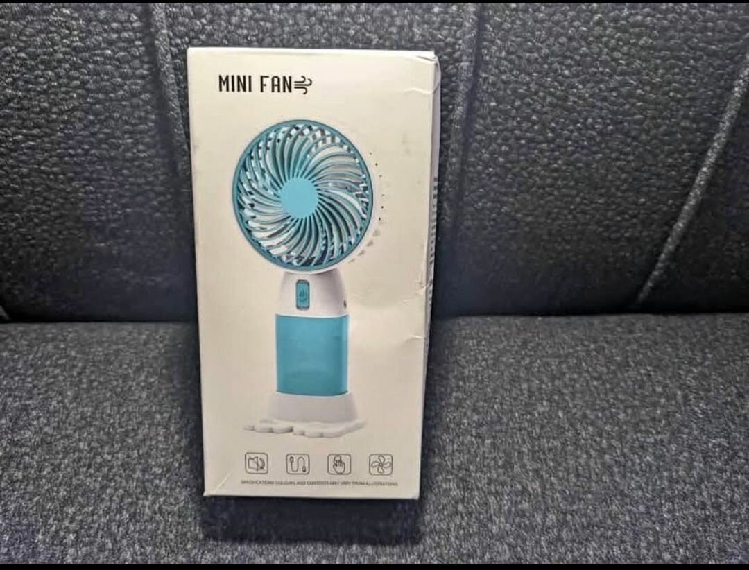 Portable hand fan.  Stay cool