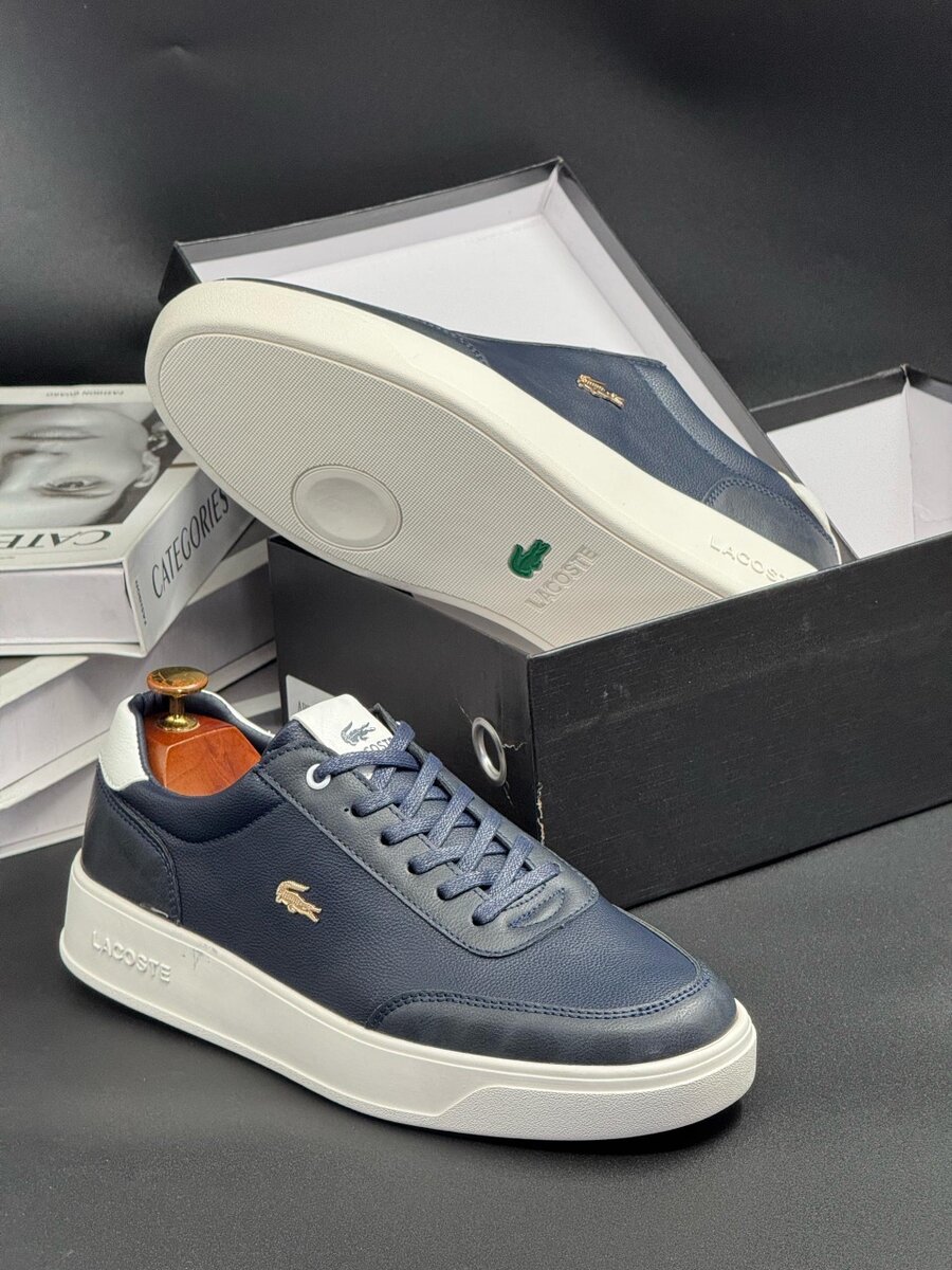 LACOSTE NAVY AND WHITE