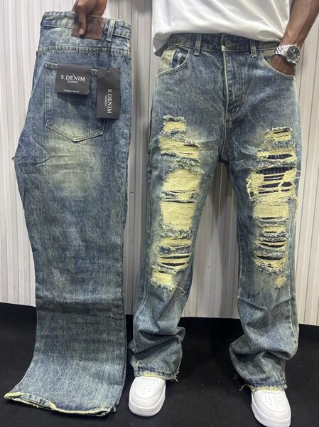 Jeans déchirés tendance homme