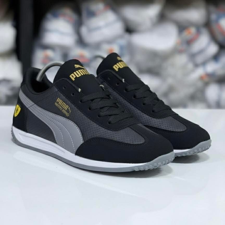 Baskets homme Puma noires