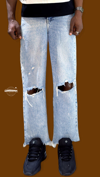 Jeans déchirés unisexes