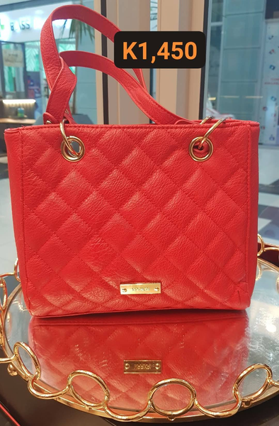 red leather bag