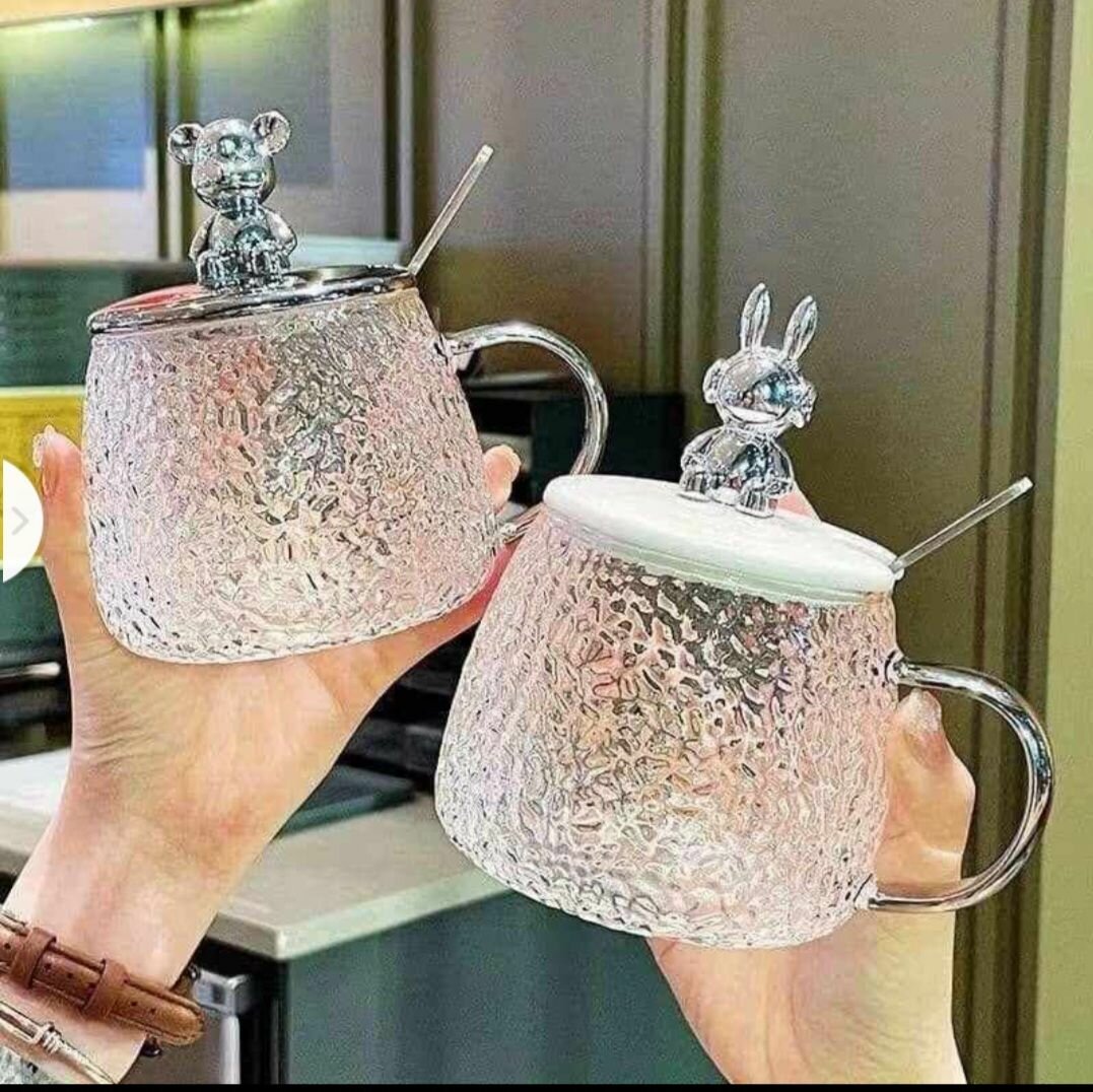 Glass bottle with straw