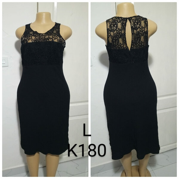 Women's dress is black, size L