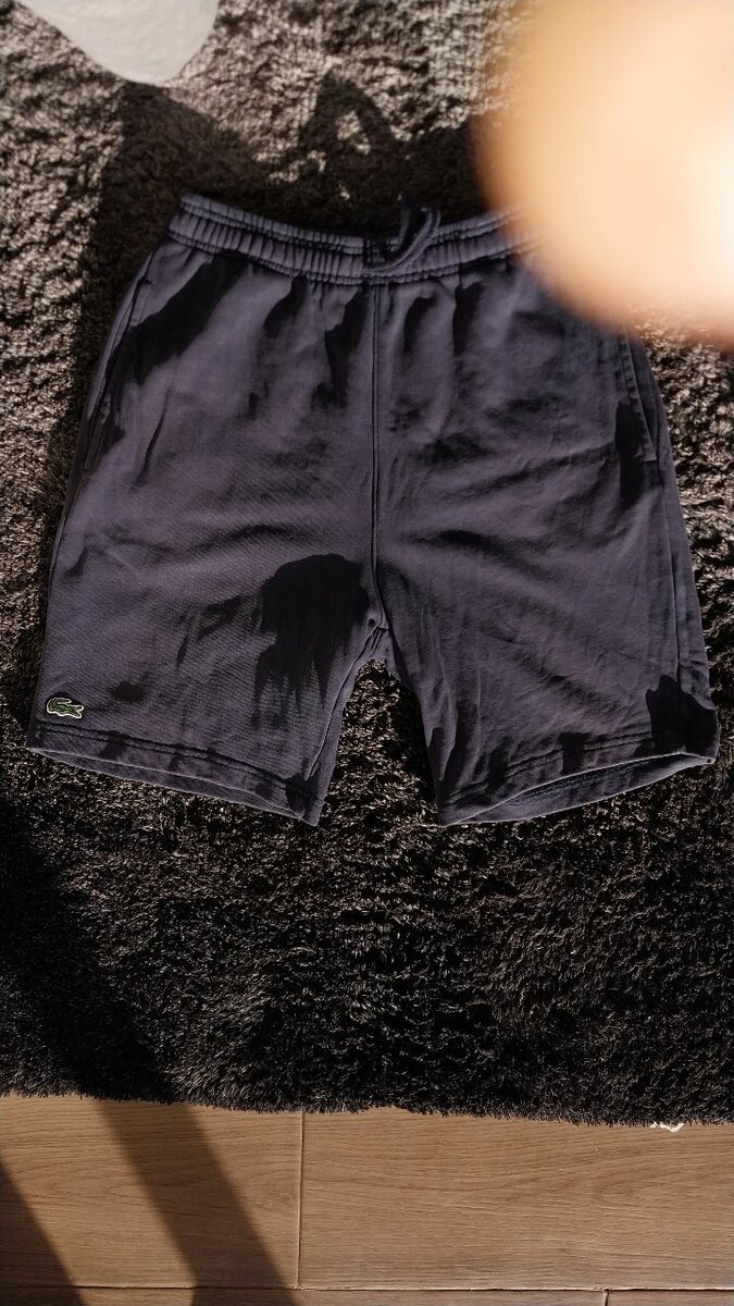 Blue Lacoste shorts
