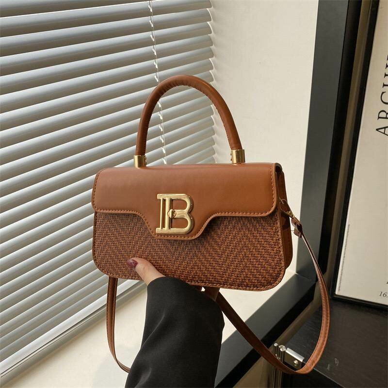 Sac à main tressé en cuir