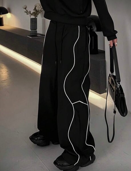 Pantalon large avec ligne décorative