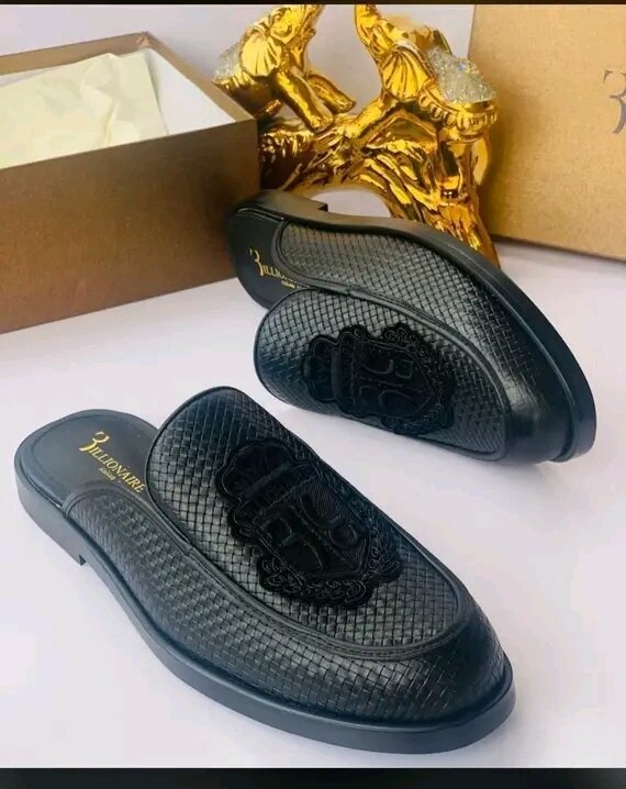 Mules en cuir noir pour homme