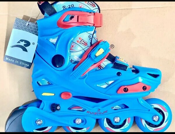 Rollers enfants bleu/rouge neufs