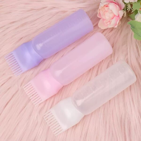Applicateur de soins capillaires