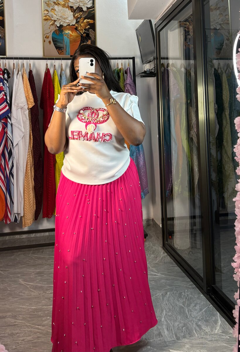 Jupe longue plissée rose