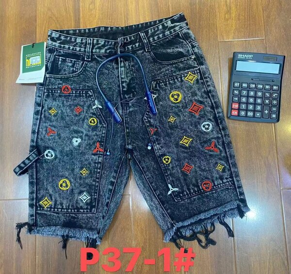 Shorts en jean avec motifs croix