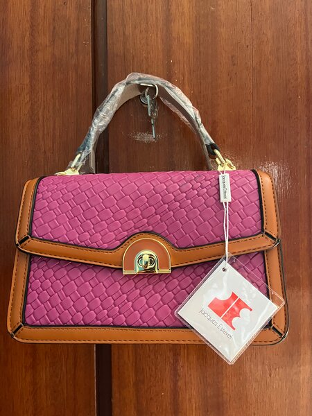 Sac à main tressé rose