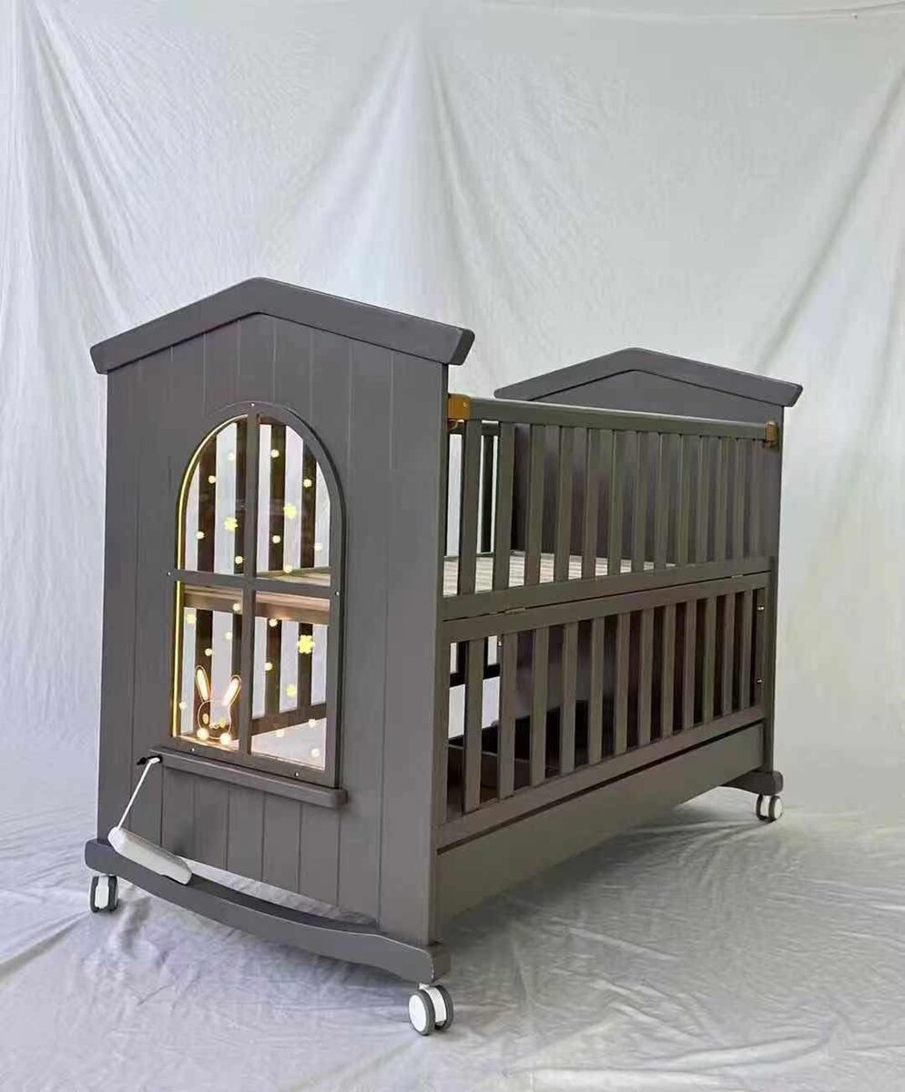 Lit bébé gris avec rangement