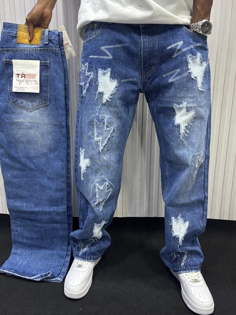 Jeans déchirés tendance homme